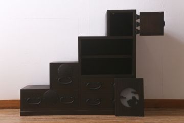 階段箪笥を新規製作!明治期の引き手と錠前金具を使用。本体は新材で製作。引き戸に月とうさぎの透かし。濃い茶色で着色し仕上げ。(和タンス、収納箪笥)