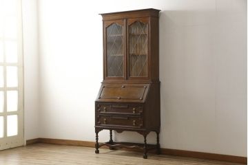 ビューローブックケースを綺麗に再生!高品質リペアを施し、ガラスの破損部分は交換。木部はワントーン落ち着いた色に着色仕上げ。