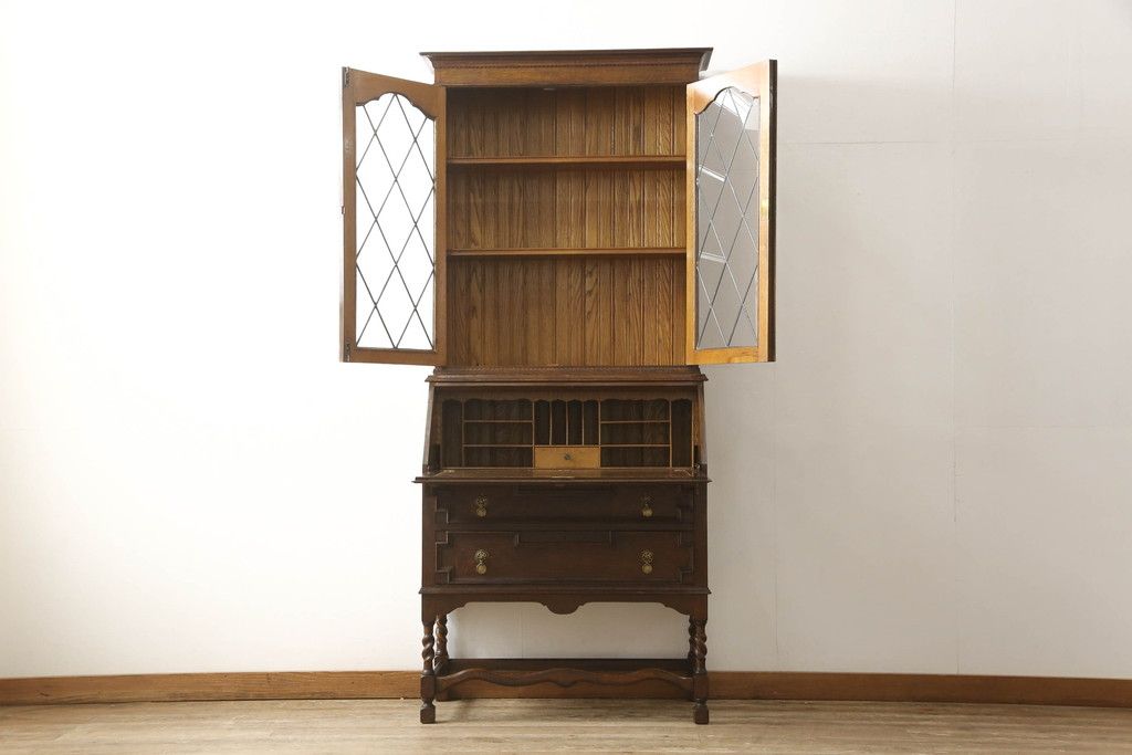 ビューローブックケースを綺麗に再生!高品質リペアを施し、ガラスの破損部分は交換。木部はワントーン落ち着いた色に着色仕上げ。