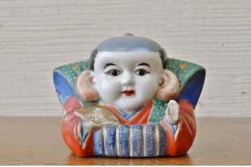 ○古い磁器製福助人形