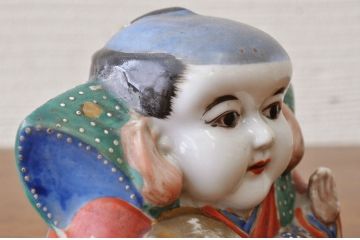 ○古い磁器製福助人形