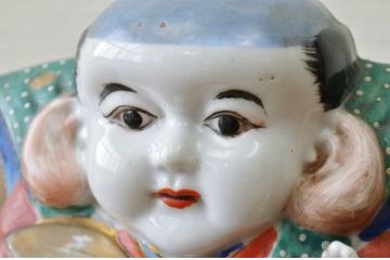 ○古い磁器製福助人形