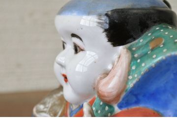 ○古い磁器製福助人形