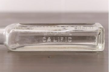 アンティーク雑貨　アメリカビンテージ　California Fig Syrup エンボスが可愛らしいガラスビン(ボトル、硝子瓶)