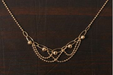 ヴィンテージアクセサリー　K18(18金)　多面カットを施したパーツが美しいビンテージネックレス　重さ約3.47g(R-042369)