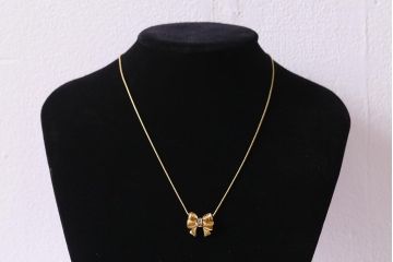 ヴィンテージアクセサリー　フランスビンテージ　イヴ・サンローラン(YVES SAINT LAURENT・YSL)　リボンが目を惹くネックレス(R-043017)