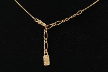 ヴィンテージアクセサリー　フランスビンテージ　イヴ・サンローラン(YVES SAINT LAURENT・YSL)　リボンが目を惹くネックレス(R-043017)