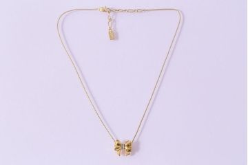 ヴィンテージアクセサリー　フランスビンテージ　イヴ・サンローラン(YVES SAINT LAURENT・YSL)　リボンが目を惹くネックレス(R-043017)