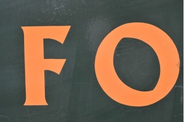 イギリスアンティーク　1930年から1950年頃　THE FORD　グリーンとオレンジのカラーリングがお洒落な看板　(R-089297)