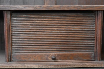 イギリスアンティーク　1900年頃　希少デザイン!!　オーク材　シャッター扉がレトロな引き出し式デスク付き本棚　(R-090128)