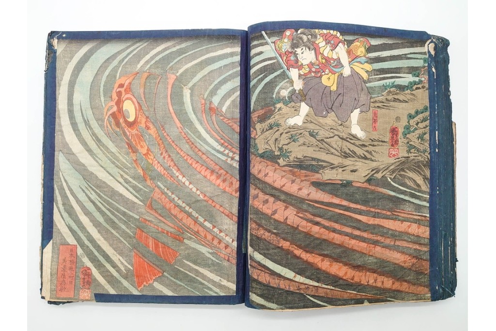 真作　浮世絵　歌川国芳・国貞・貞秀など　大蛇・妖狐・小李廣花栄・浪裡白跳張順・鬼若丸の鯉退治　3枚続を含む木版画帳　(R-090237)
