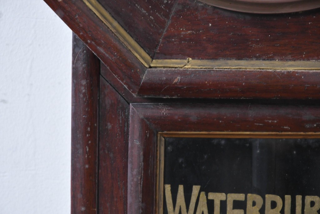アメリカアンティーク　1910年頃　WATERBURY CLOCK CO.(ウォーターベリー)　深い色合いと金色の組み合わせがお洒落な八角壁掛け時計　(R-091483)