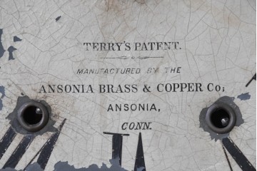 アメリカアンティーク　1870年頃　Ansonia Clock Company(アンソニア)　ローマ数字と日付目盛りを配した丸型文字盤の掛け時計　(R-091835)
